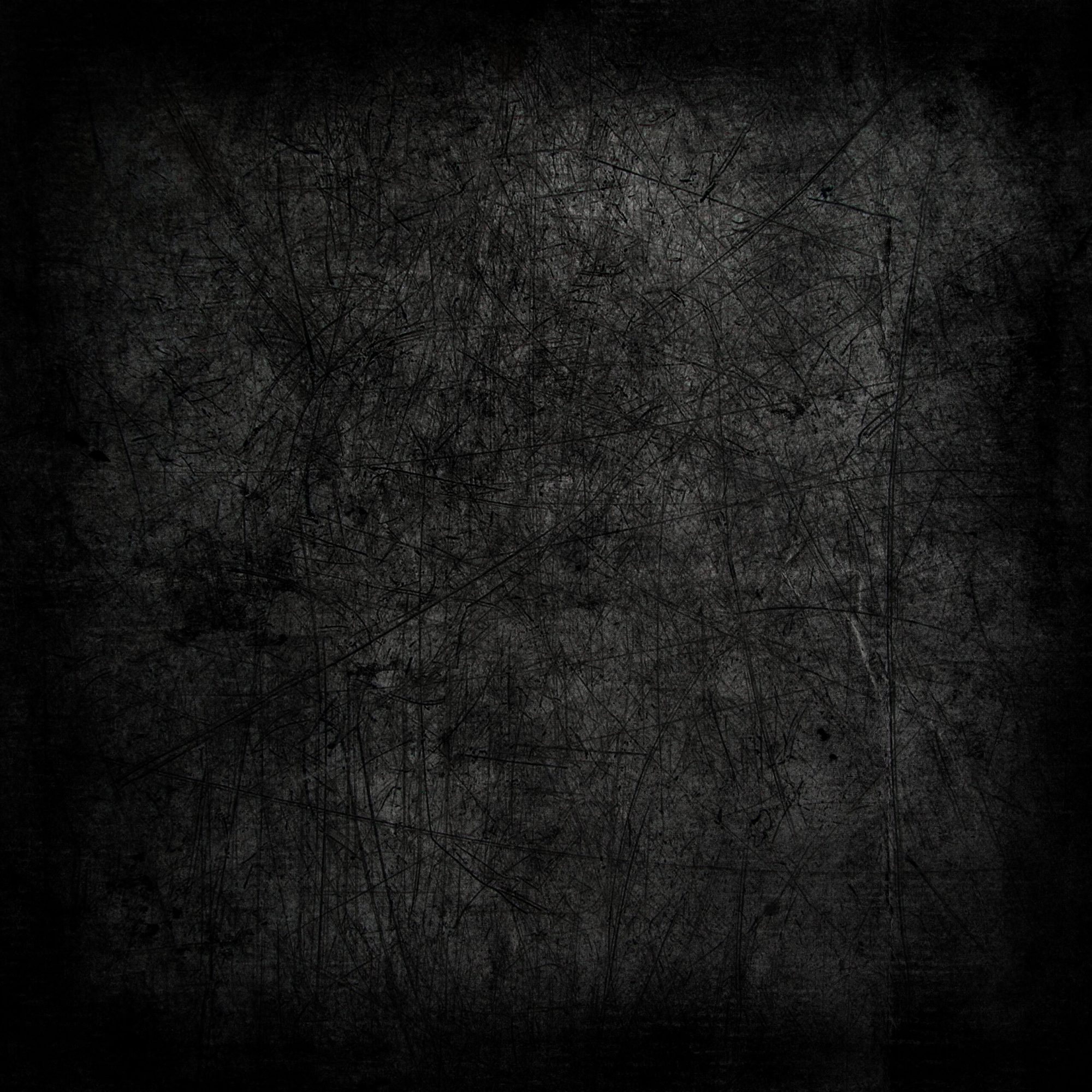 Dark abstract grunge texture background with scratches and stains
